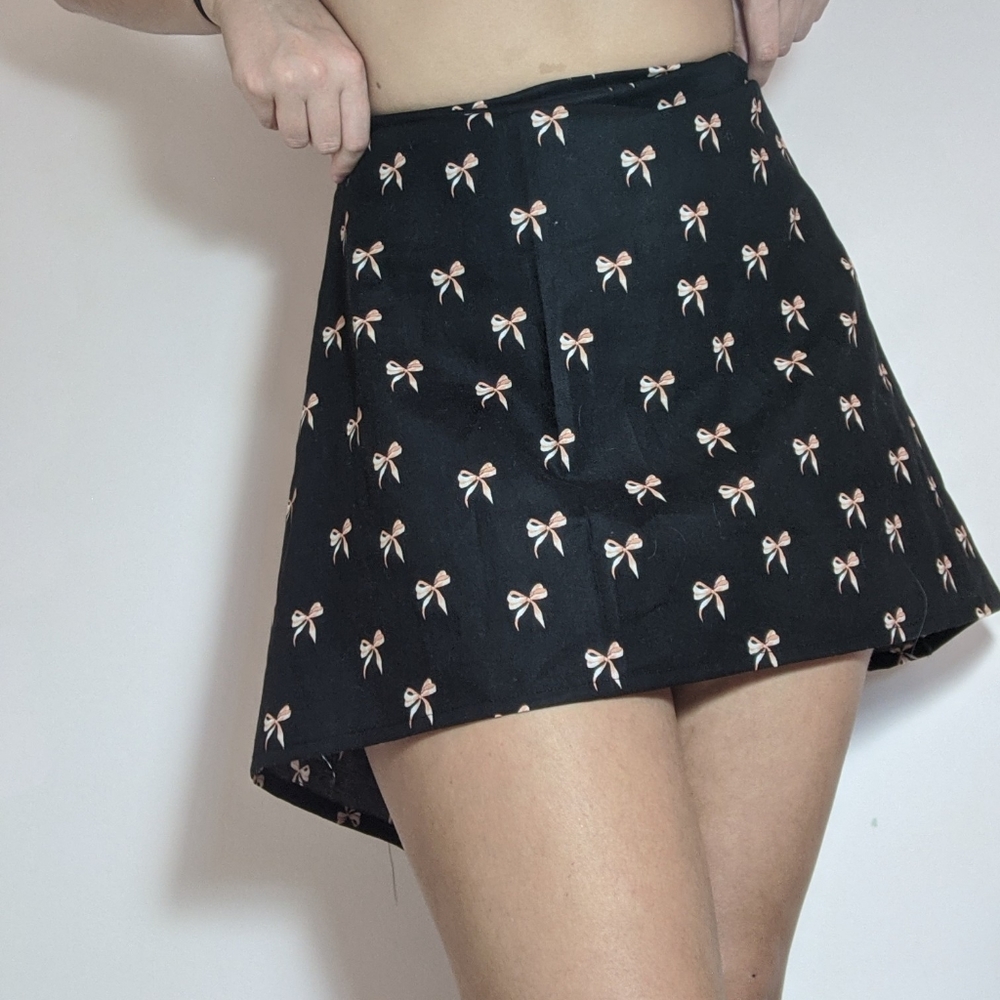 Adorable bow skirt short in front long in back